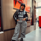 SHE AIN’T DONE YET – Stylish Ms. Sassy Edition T-Shirt