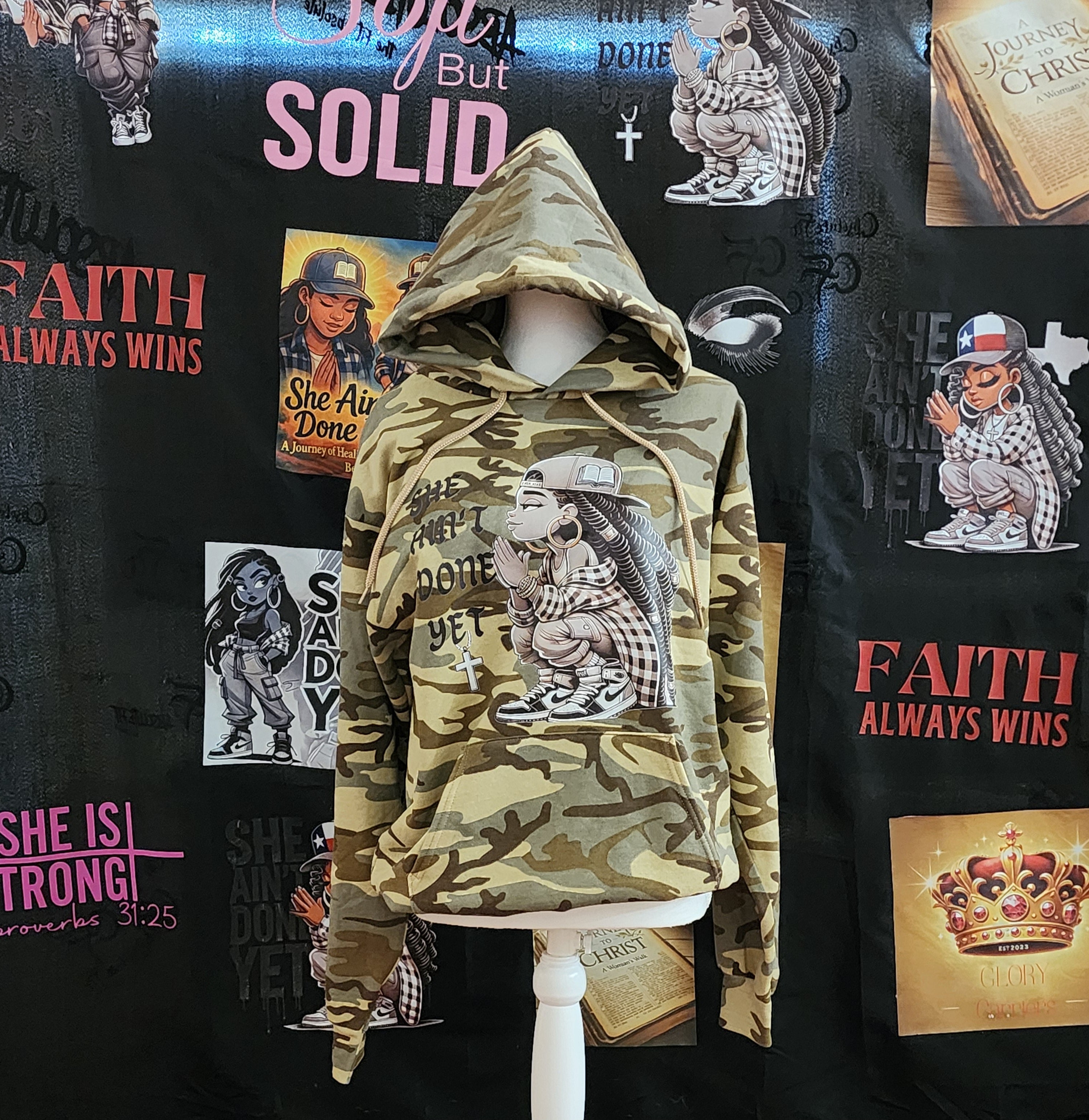 SHE AIN’T DONE YET – Camouflage Hoodie